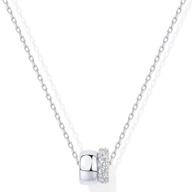 e double-round ring pendant set with zirconia stones