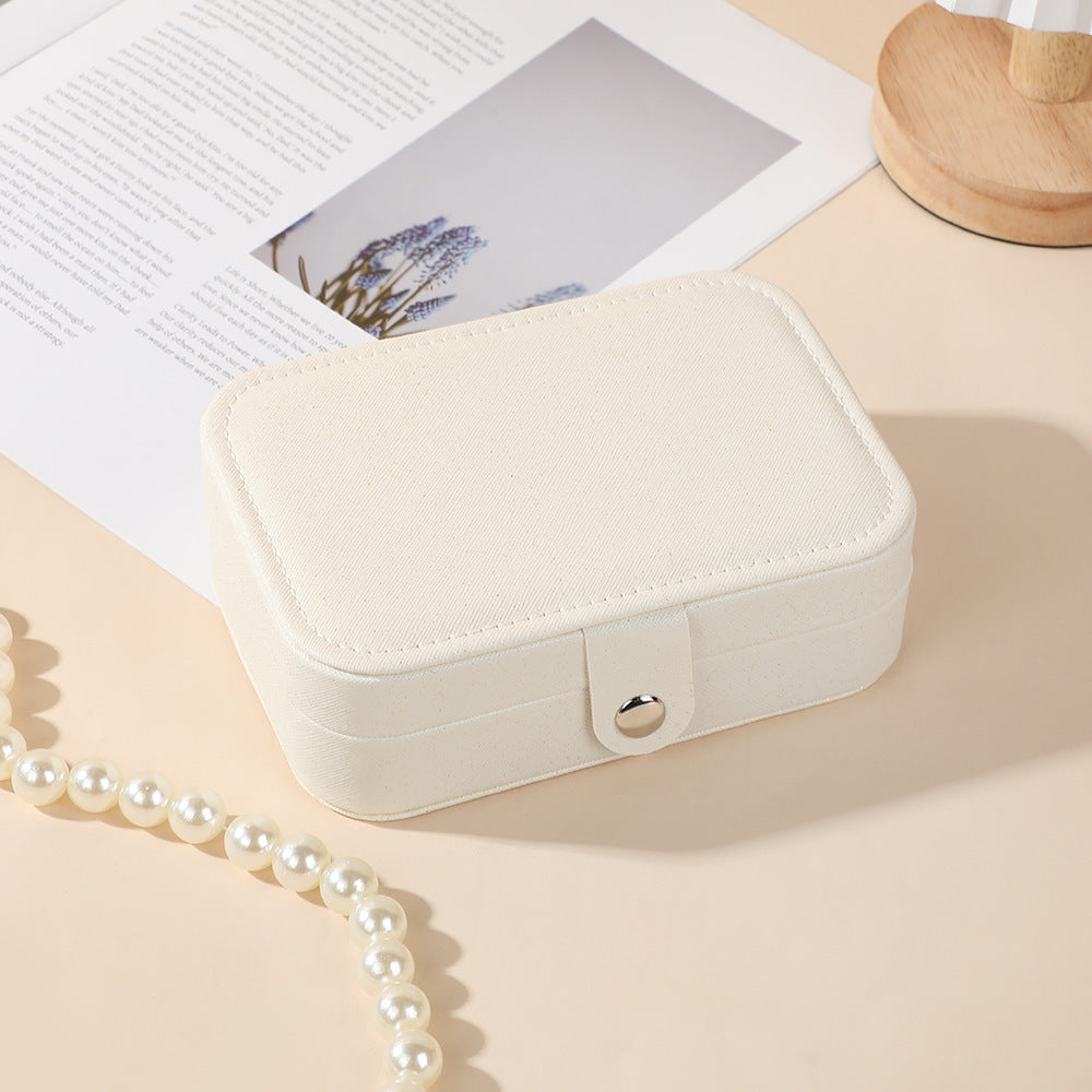 Portable travel jewelry storage box