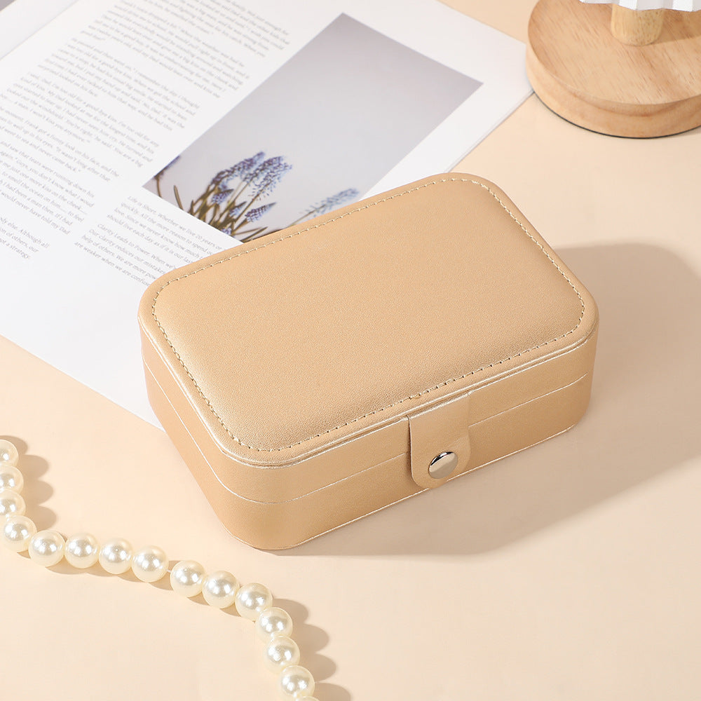 Portable travel jewelry storage box